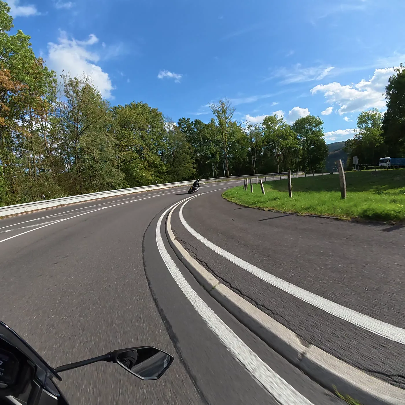 A square frame from a helmet camera, with the crop of the chosen format drawn on it.